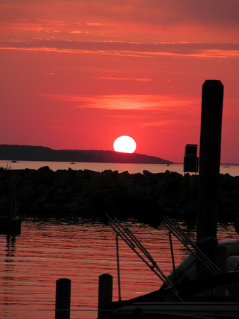 Sunset Over Lake Charlevoix From Marina In Boyne City, MI